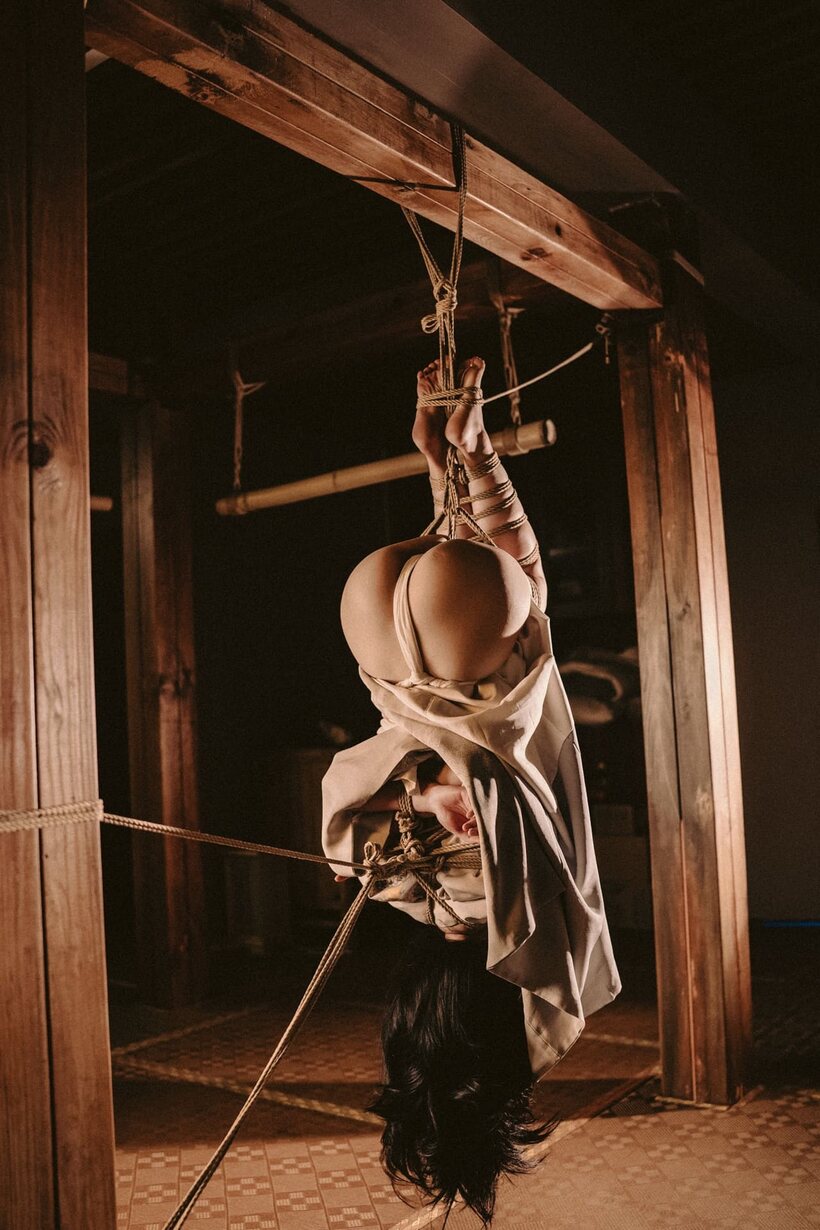 Asian nude photo 9 — Bound upside down, an Asian babe teases her big booty