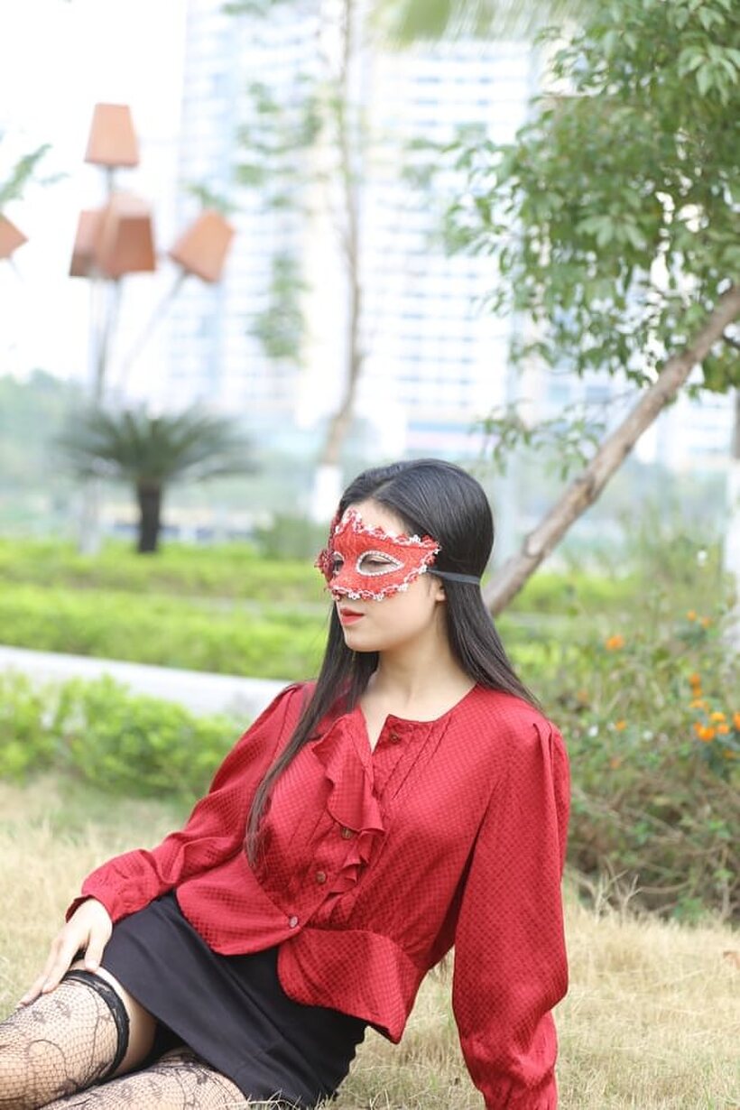 Photo 16 — Outside in stockings and heels, masked Asian beauty strikes a pose
