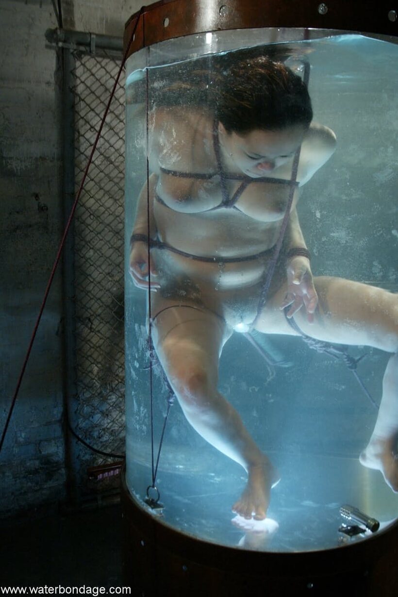 Annie Cruz strokes her pussy in a wet BDSM solo scene, photo 17 of 21