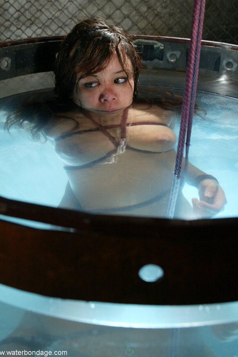 Annie Cruz strokes her pussy in a wet BDSM solo scene (shot 19)