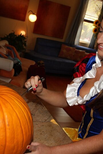 Alyson Westley poses with a pumpkin and flashes her pussy solo