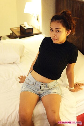 Petite girl flaunts her small tits while teasing