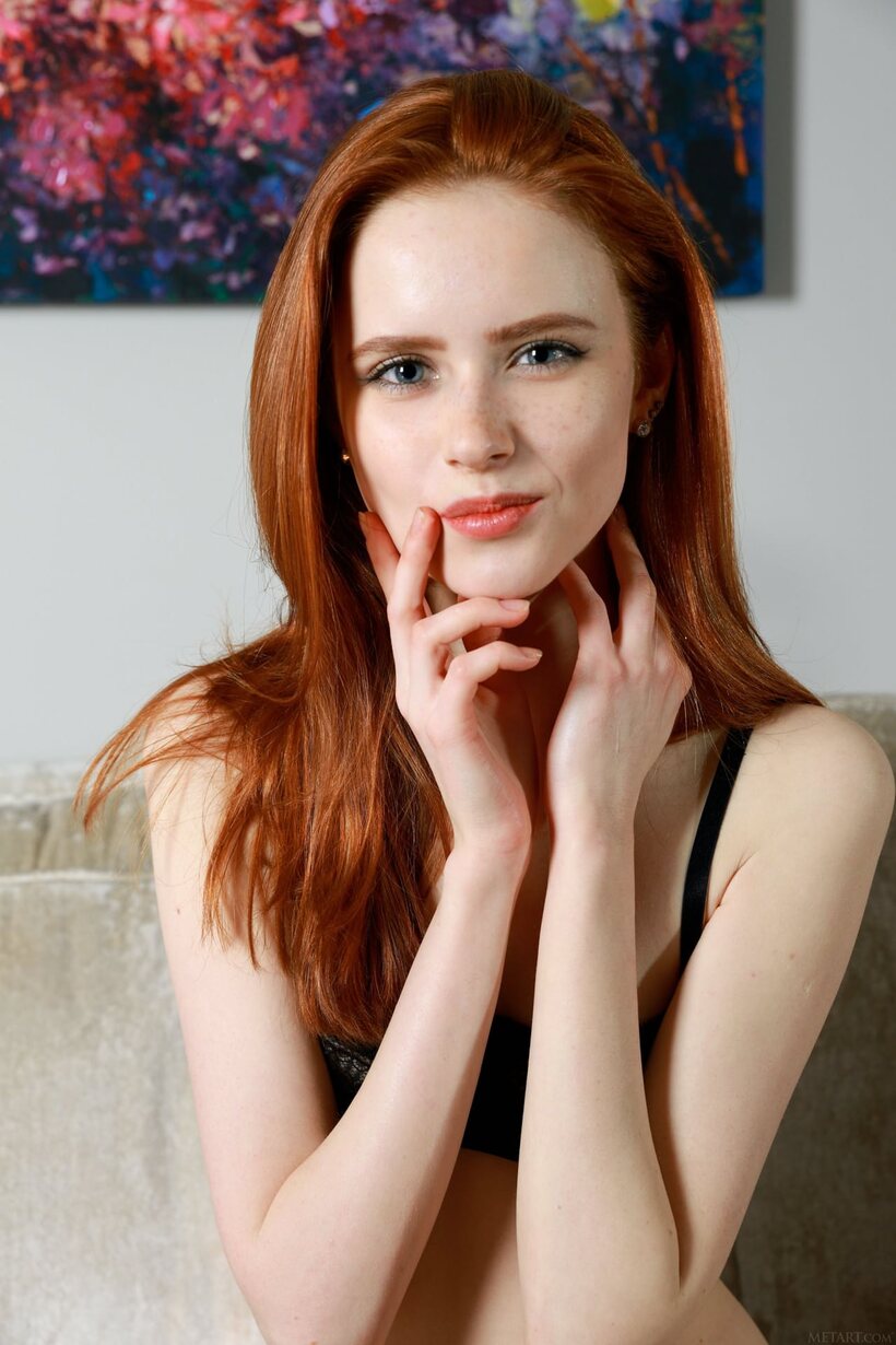 Photo 2 — Skinny Bella Milano shows her small tits and asshole while spreading