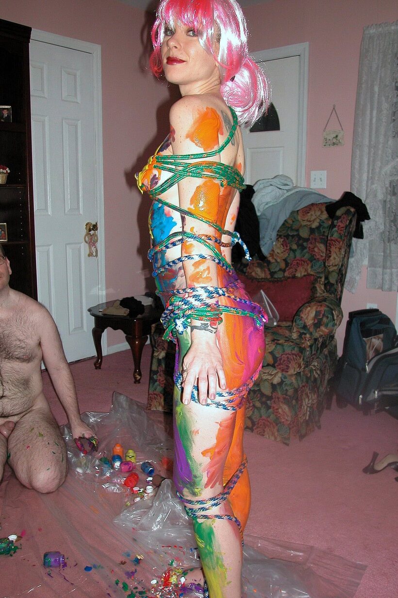 Photo 15 — Michelle Brookes gets tied down and soaked with body paint in the bath