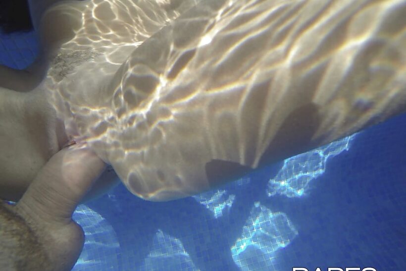 Martina Gold and her boyfriend play underwater before poolside anal (shot 6)