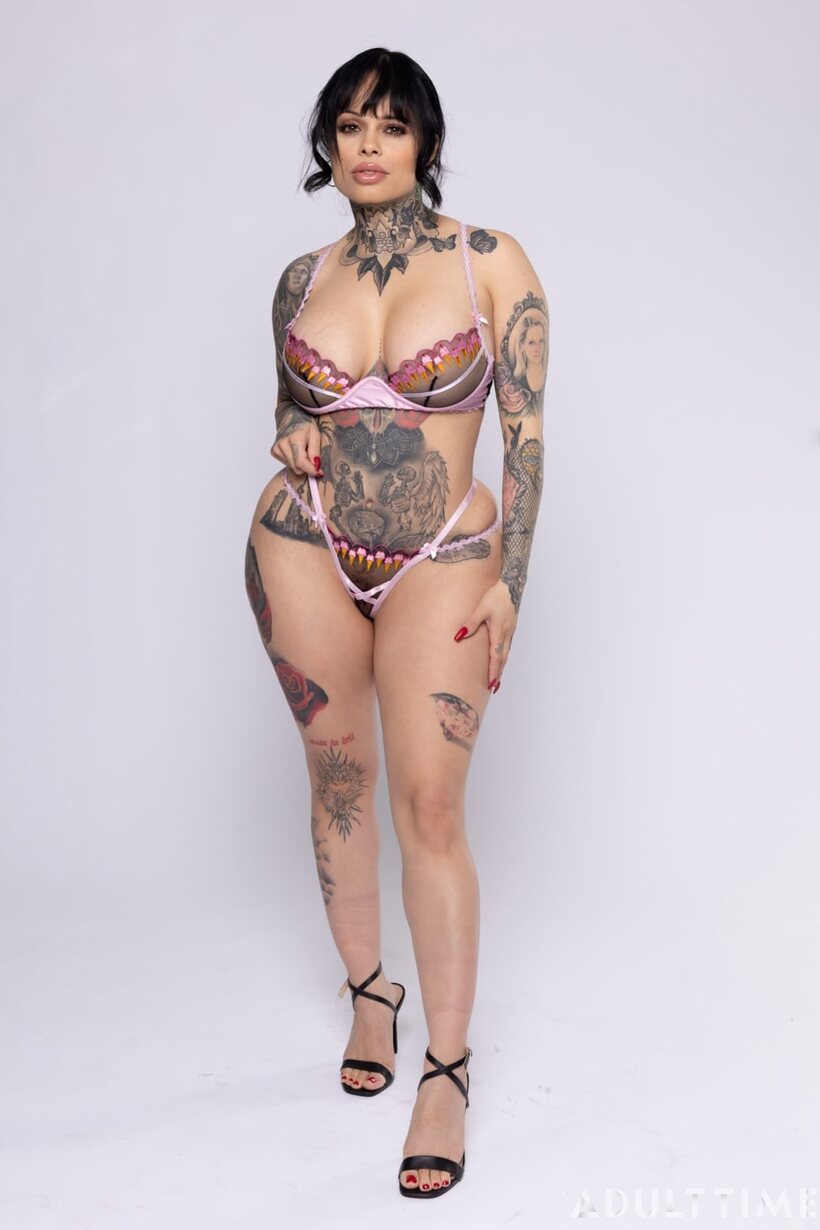 Photo 3 — Chubby Natasha Nice poses with her big tits on display in lingerie with XWife Karen