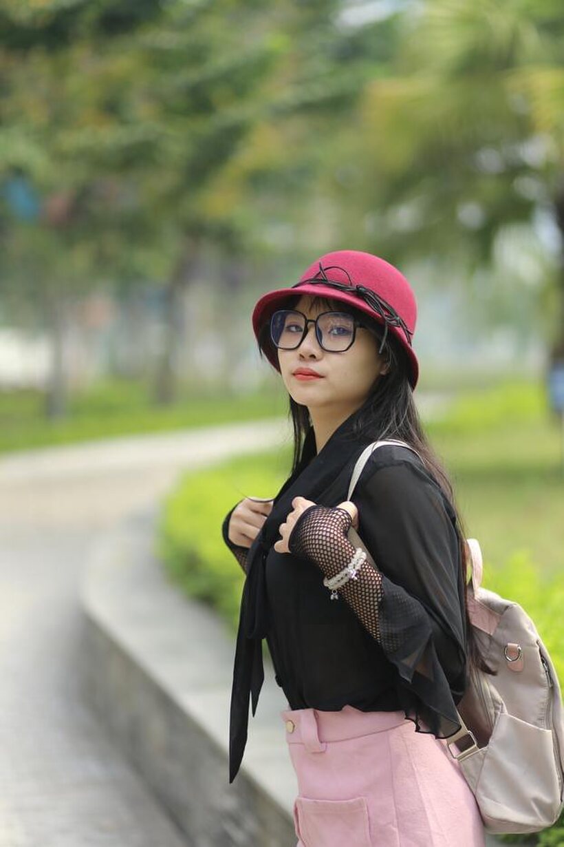 Photo 4 — Asian girl strips out of her shorts and poses naked