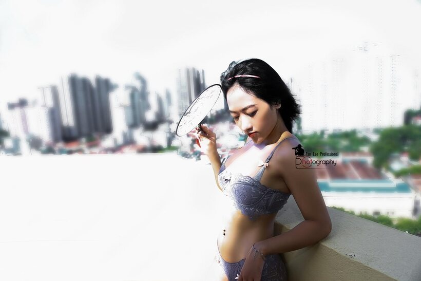 Image 1/21: Asian girl flaunts her ass