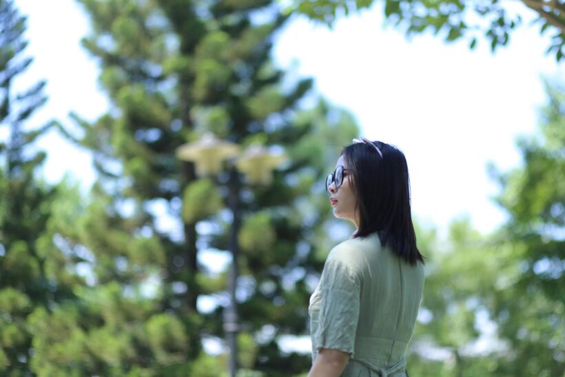 Image 4/21: Beautiful girl in a skirt shows her ass outdoors