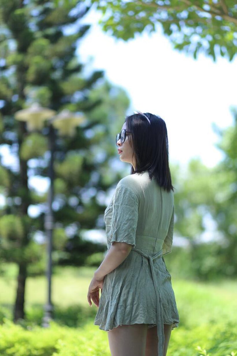 Image 5/21: Beautiful girl in a skirt shows her ass outdoors