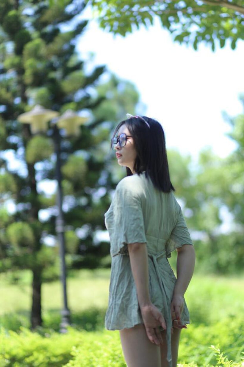 Photo 10 — Beautiful girl in a skirt shows her ass outdoors