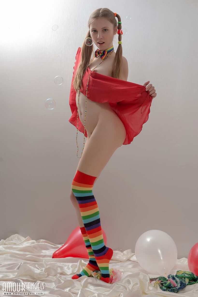 Ass nude photo 12 — Pigtail teen in colorful socks strips off her clothes