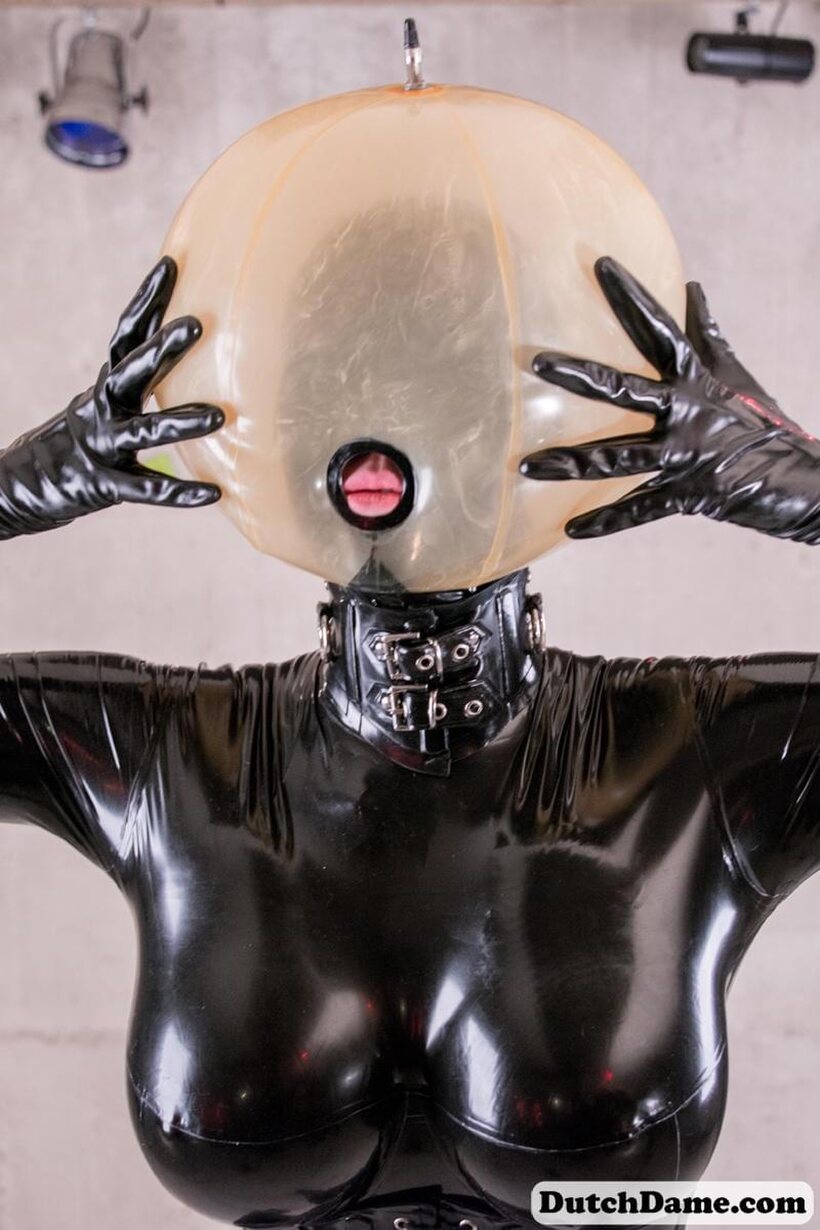 BDSM pic 13 from the set «Latex slave gets strapped in and hooded inside the dungeon»