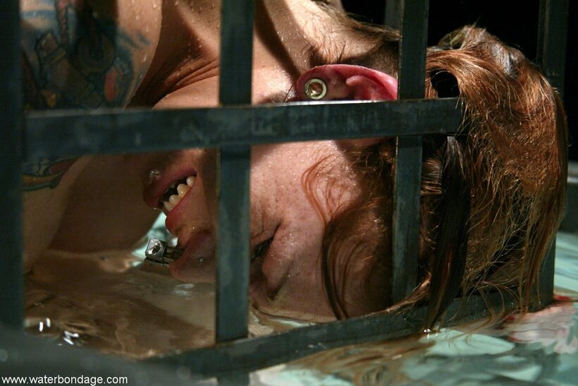 Scarlett Pain pic 9 from the set «Redhead Scarlett Pain shows her natural tits tied up»