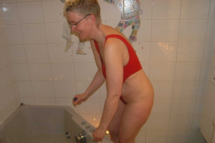 Tiffany Pearl pic 8 from the set «Blonde Tiffany Pearl up close: wet pussy and legs in a micro bikini»
