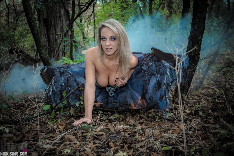 Nikki Sims drops the fairy wings and poses in a thong (shot 6)