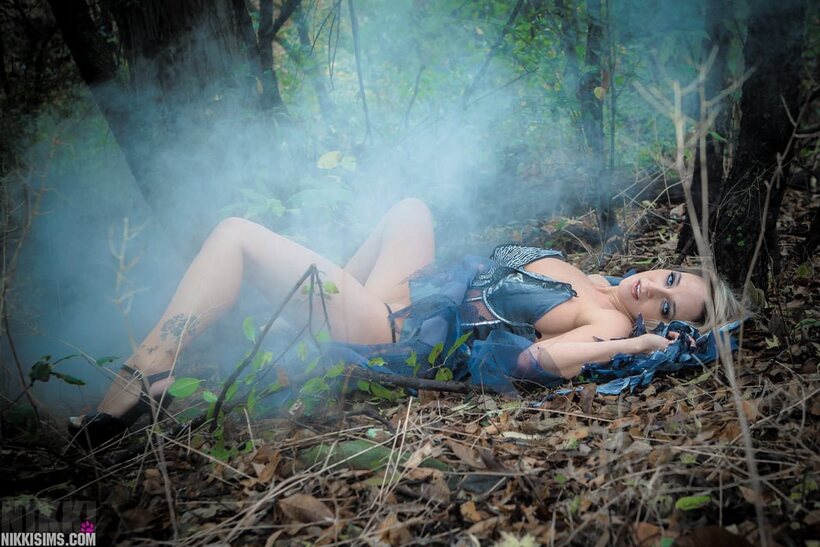 Photo 10 — Nikki Sims drops the fairy wings and poses in a thong