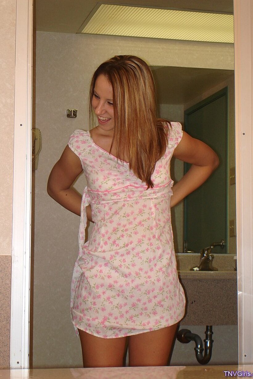 Cute nude photo 6 — Brie slips out of her dress and shows off her natural tits and ass
