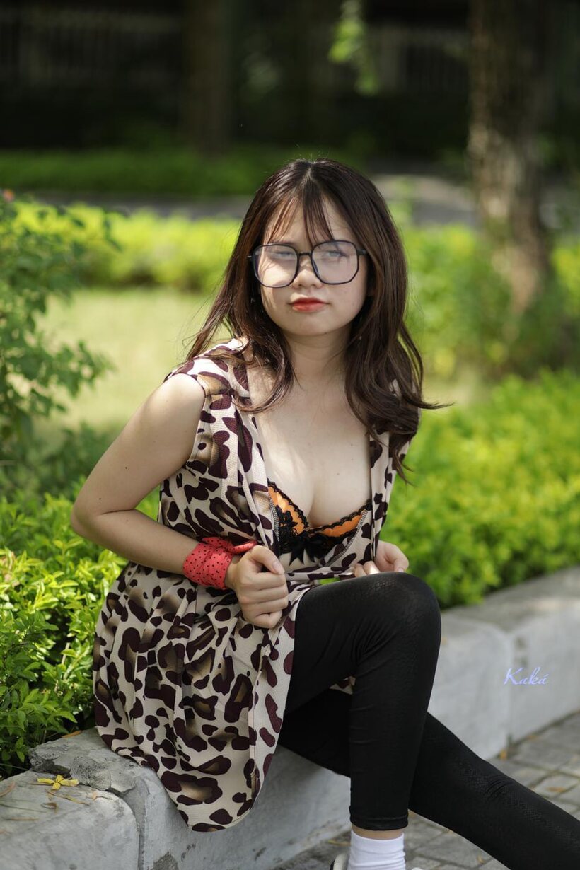 Amateur nude photo 12 — Patterned dress slips back as a sexy Asian babe reveals her bra