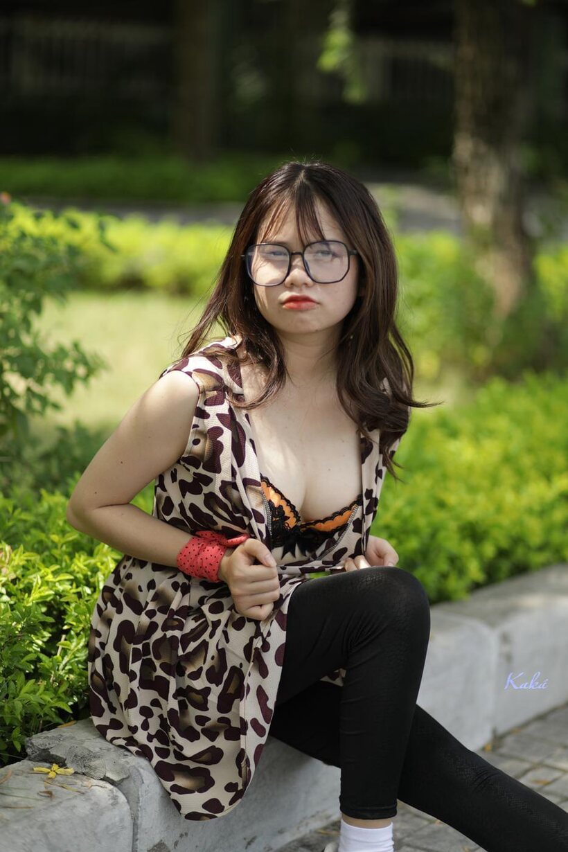 Amateur nude photo 13 — Patterned dress slips back as a sexy Asian babe reveals her bra