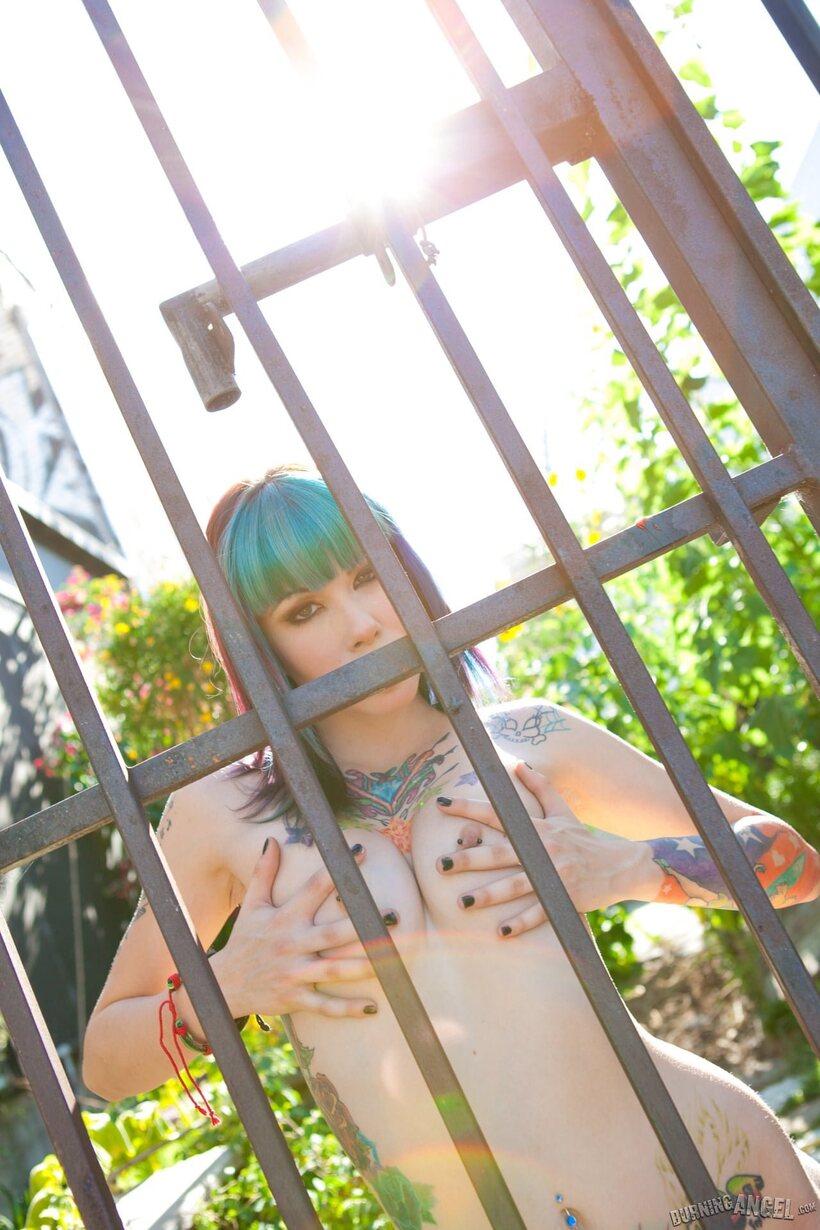 Emo Krysta Kaos poses with her pierced nipples on display in boots (shot 16)