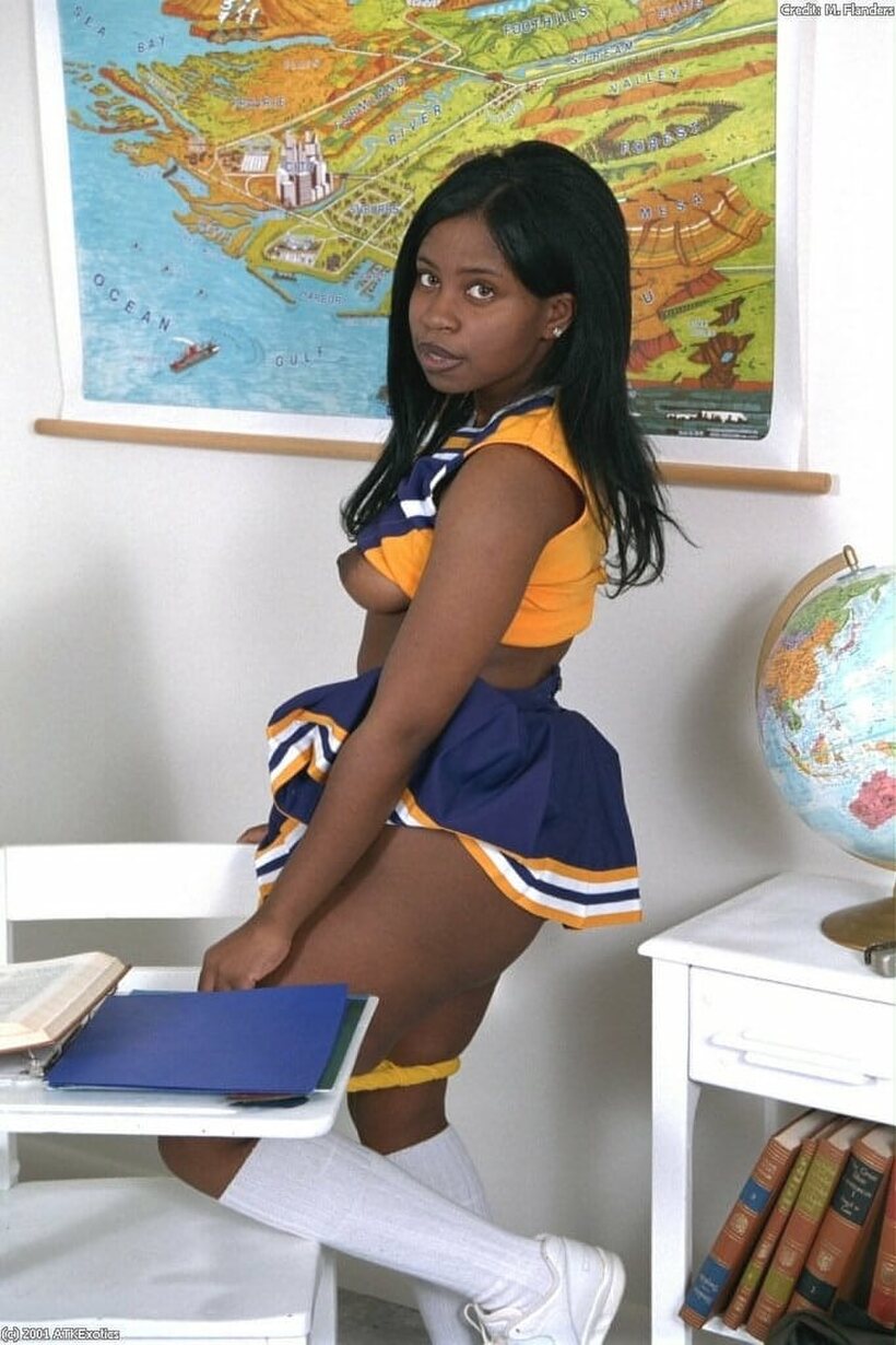 African pic 5 from the set «Schoolgirl shows her hairy pussy and ass while flashing upskirt»