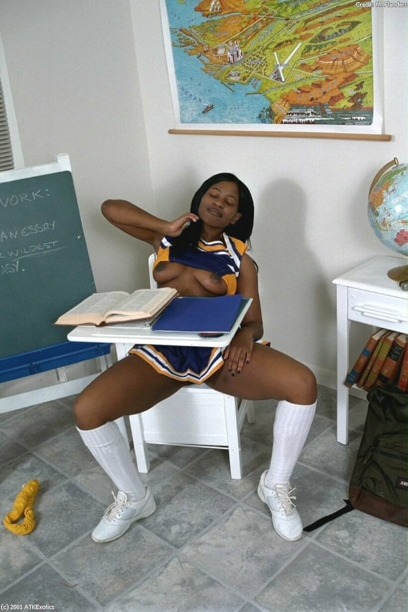 African pic 7 from the set «Schoolgirl shows her hairy pussy and ass while flashing upskirt»