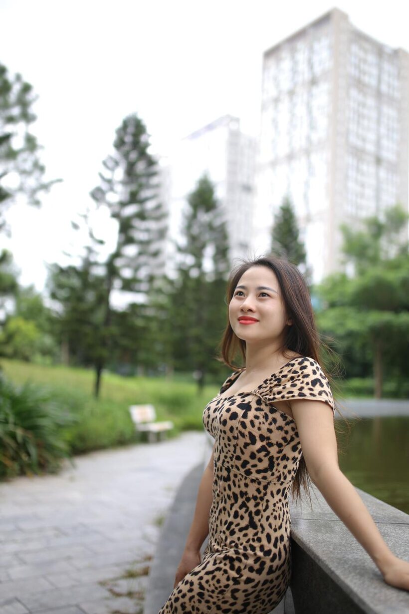 Photo 11 — Asian girl strips out of her skirt and poses naked