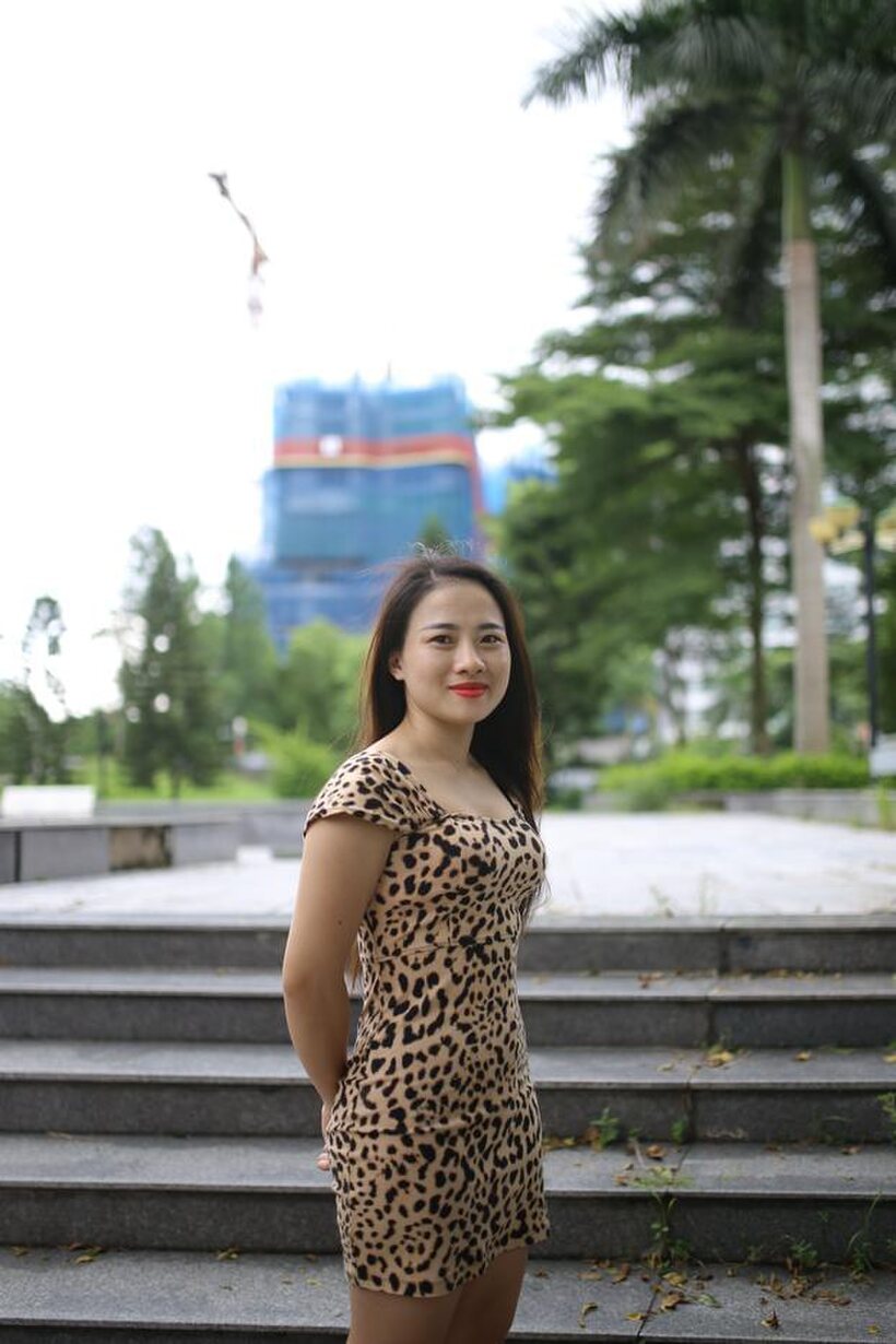 Image 14/21: Asian girl strips out of her skirt and poses naked