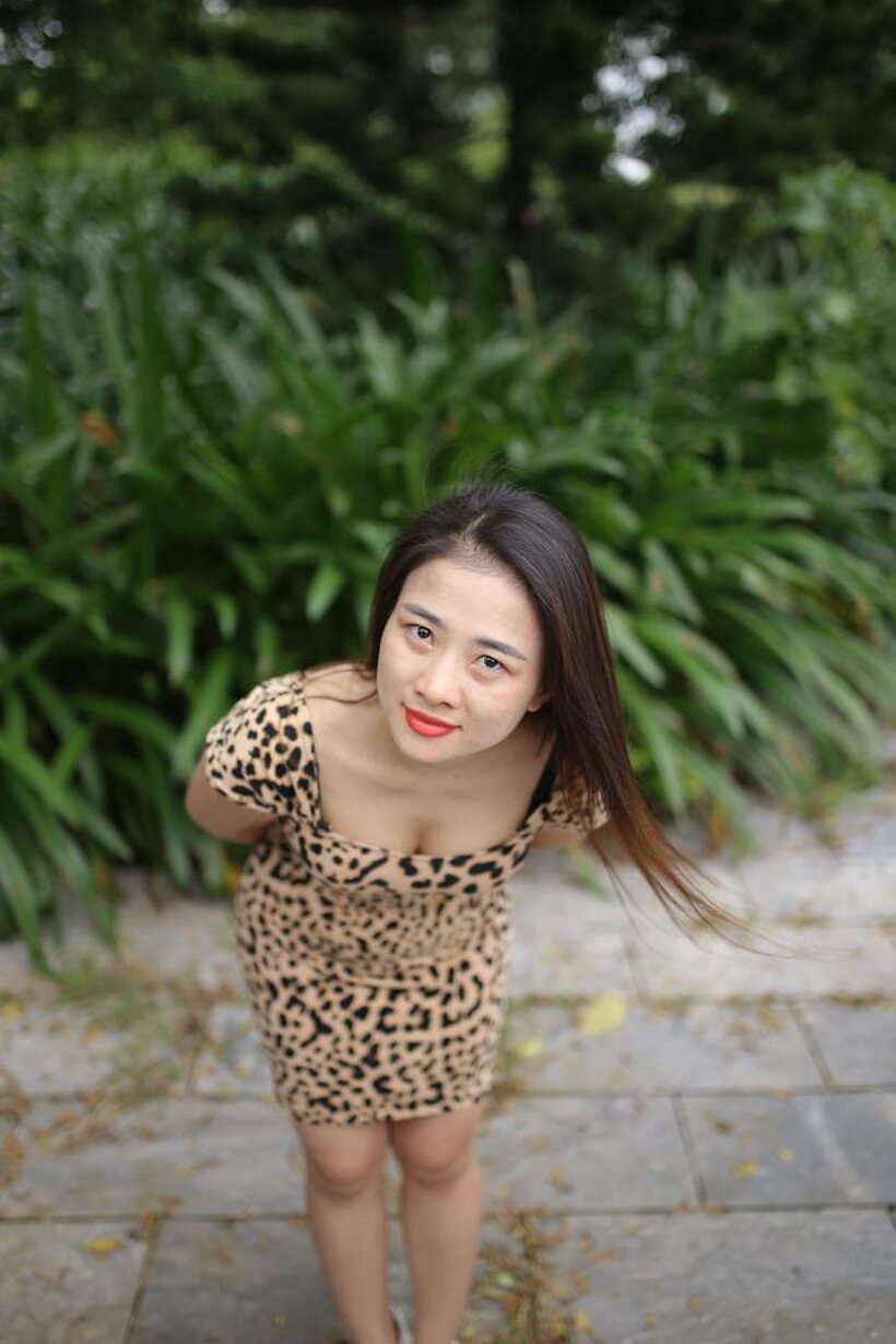 Image 16/21: Asian girl strips out of her skirt and poses naked