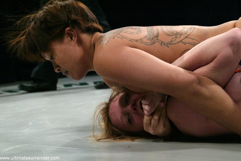 DragonLily and Dee Williams stretch out before their lesbian wrestling match (shot 15)