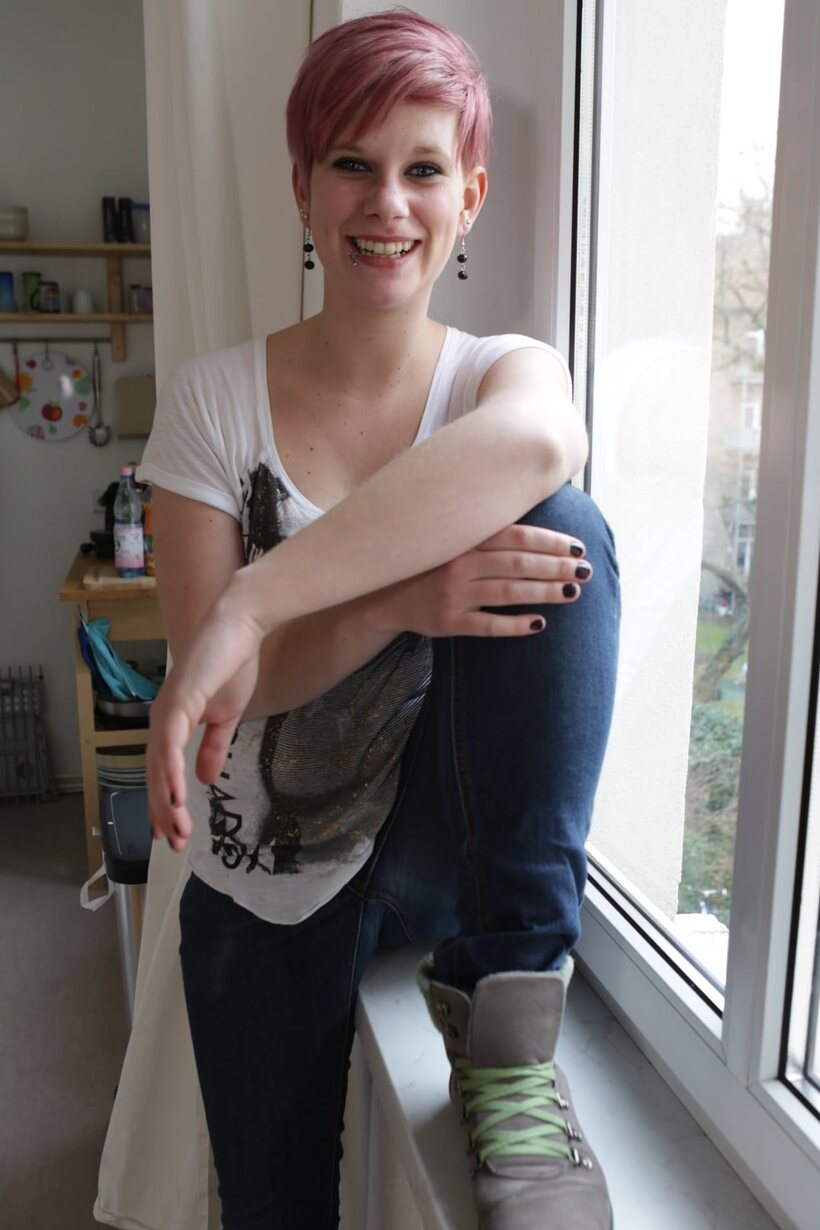 Photo 10 — Redhead girl in pantyhose shows her small feet and bubble butt
