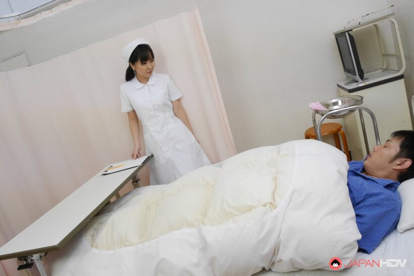Miyuki Ojima nude photo 1 — Miyuki Ojima gives a patient a blowjob during her nurse shift