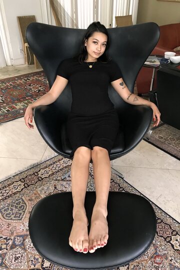 Iris Ivy shows off her toes and Asian pussy up close