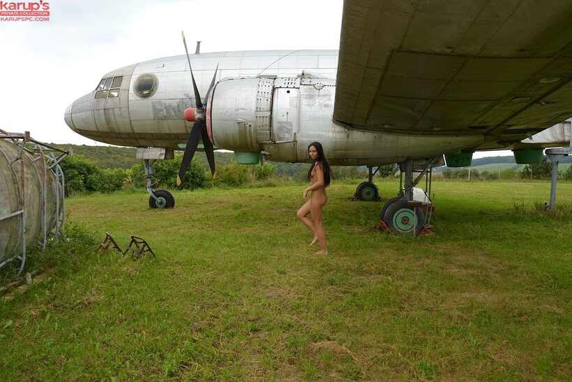 Amateur nude photo 5 — Agnes and Bailey pose nude and snap pics by a giant airplane