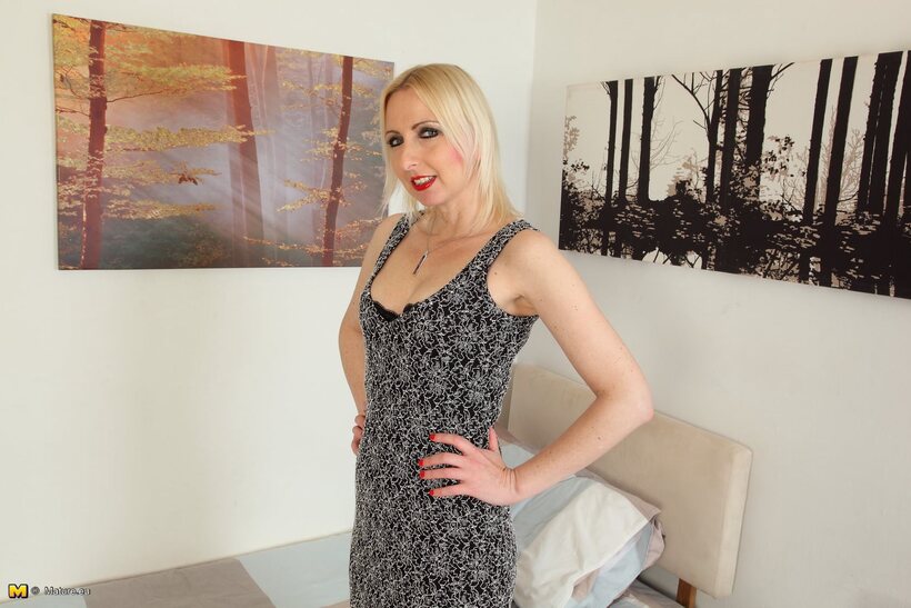 Ass pic 2 from the set «Stripping down to hose and heels, a blonde BBW sprawls on bed»