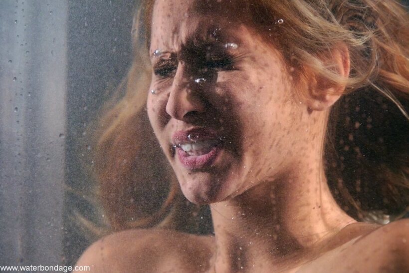 Isis Love pic 11 from the set «Isis Love gets her pussy rubbed during water tank bondage»