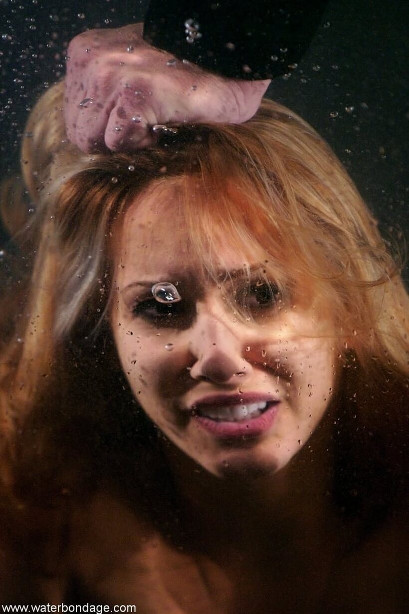 Isis Love gets her pussy rubbed during water tank bondage, photo 13 of 21