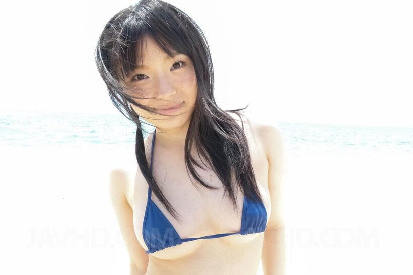 Image 1/15: At the beach, Hina Maeda sucks and wanks her man friend