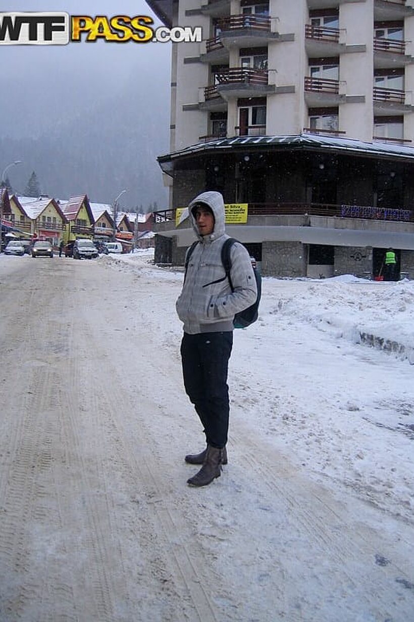 Amateur couple snaps selfies during a visit to a snowy town (shot 1)