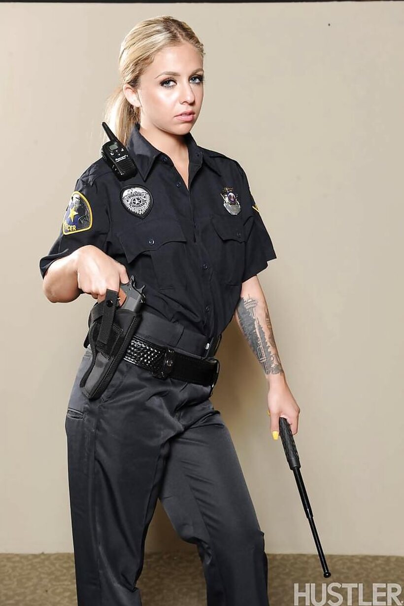 Madelyn Monroe slips her boobs out of a police uniform, photo 2 of 12