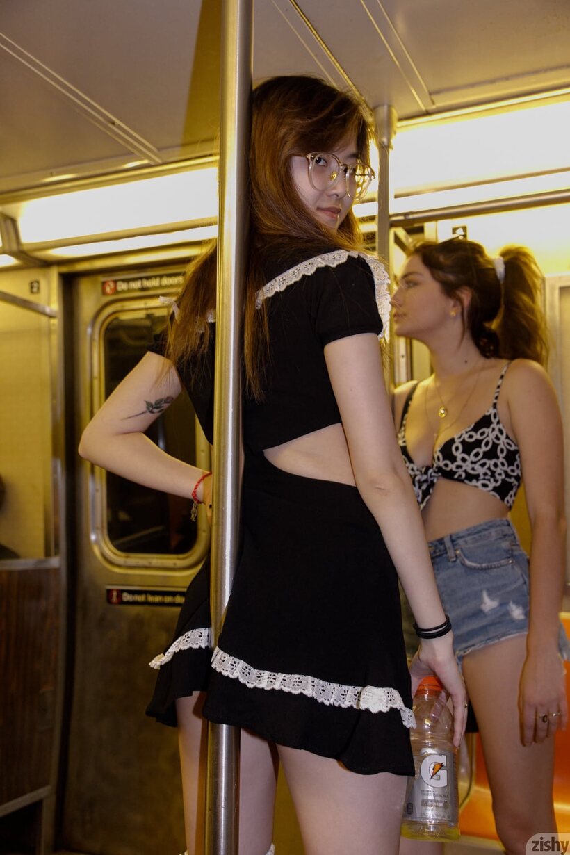 Skye Blue and her girlfriends strike sexy poses in public wearing skimpy outfits (shot 12)
