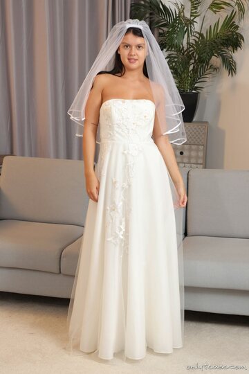 Kelsey strips out of her wedding dress with a teasing little show