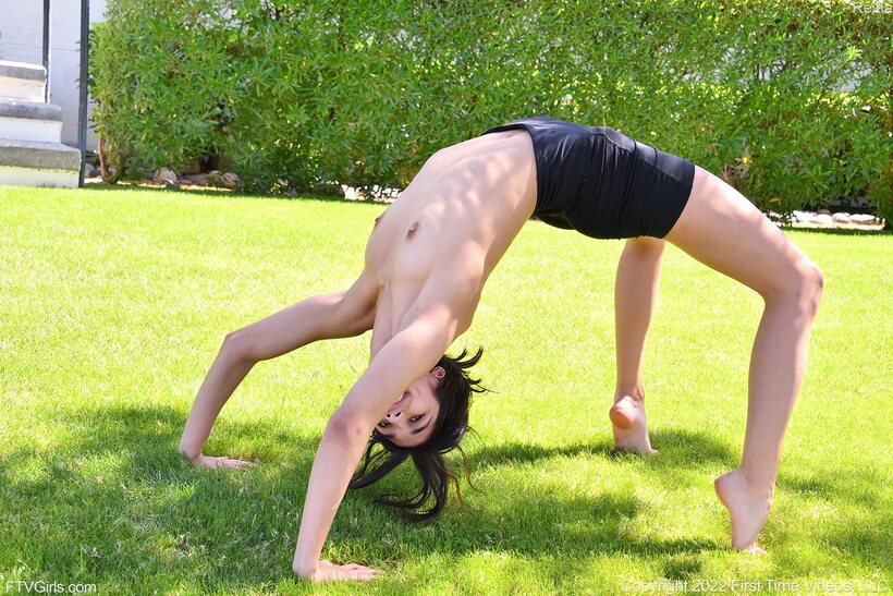 Reina Rae nude photo 8 — Going naked outside, Reina Rae stretches out in shorts before exercising