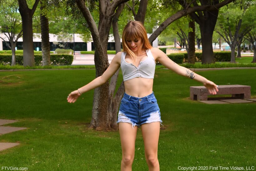 Amateur nude photo 3 — Angel flashes her natural tits outdoors in the park
