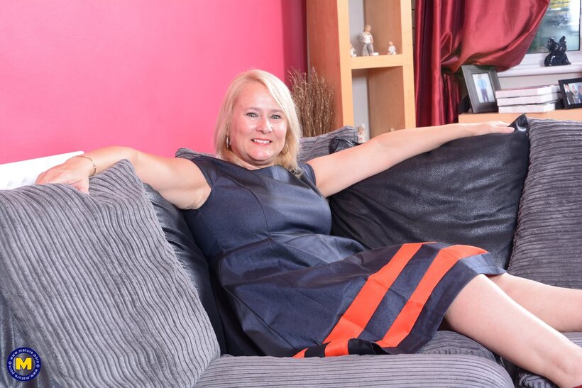 BBW pic 4 from the set «Older blonde undresses on the sofa before dildoing herself»