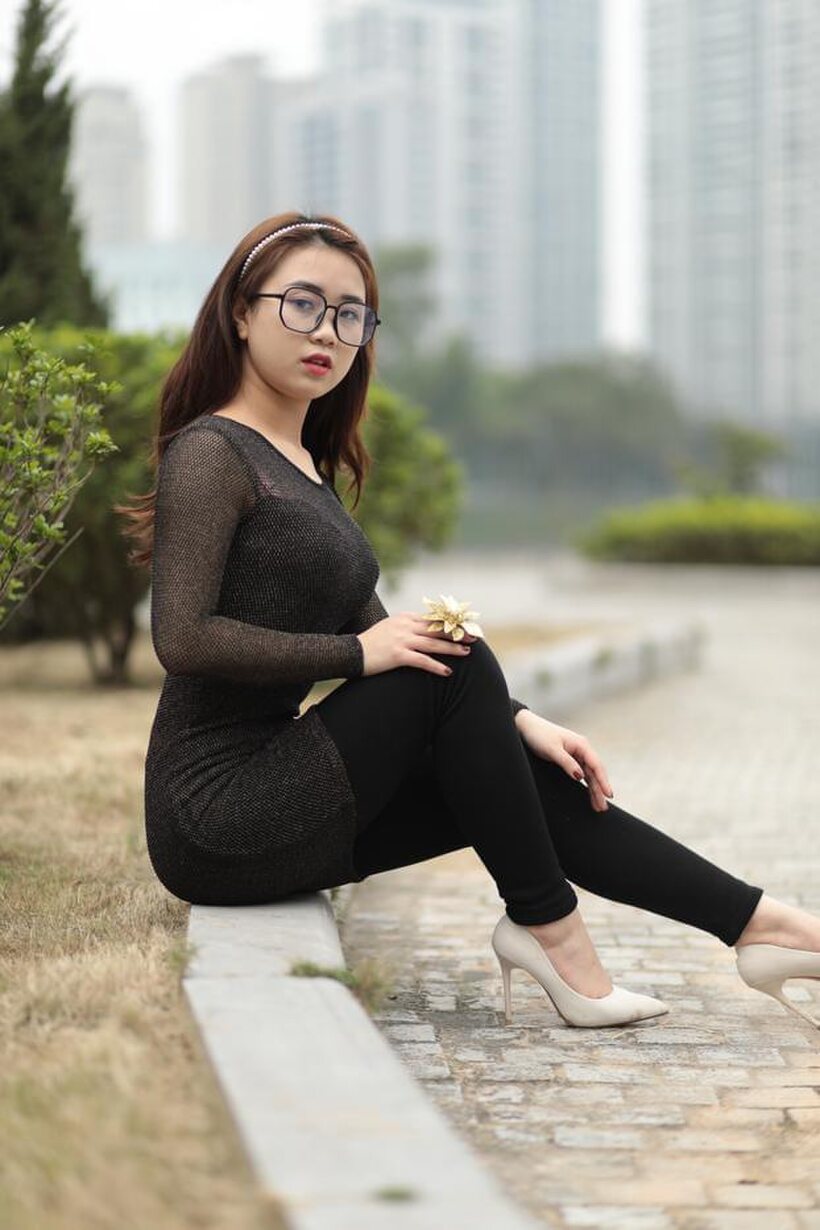 Amateur nude photo 3 — Asian babe in glasses shows off her tight outfit outdoors