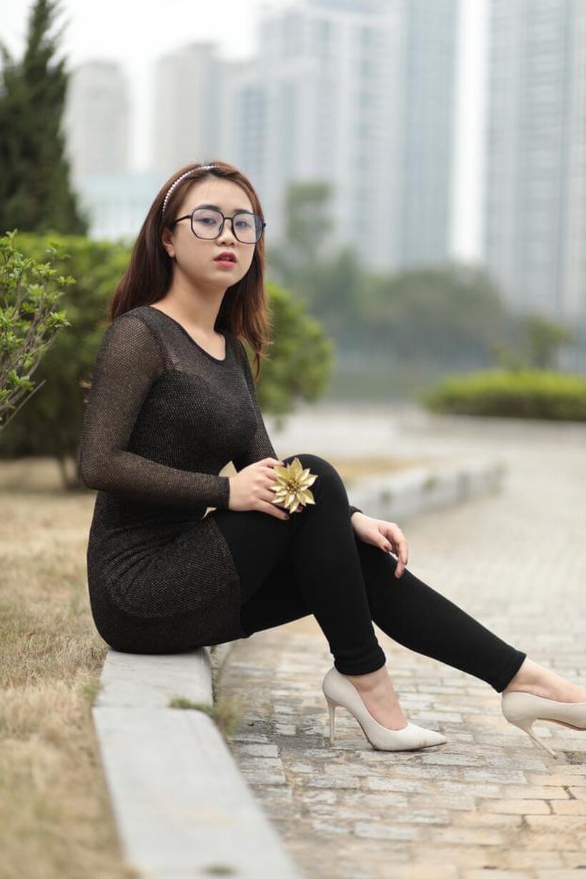 Amateur pic 4 from the set «Asian babe in glasses shows off her tight outfit outdoors»