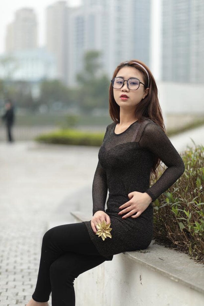 Asian babe in glasses shows off her tight outfit outdoors, photo 10 of 21