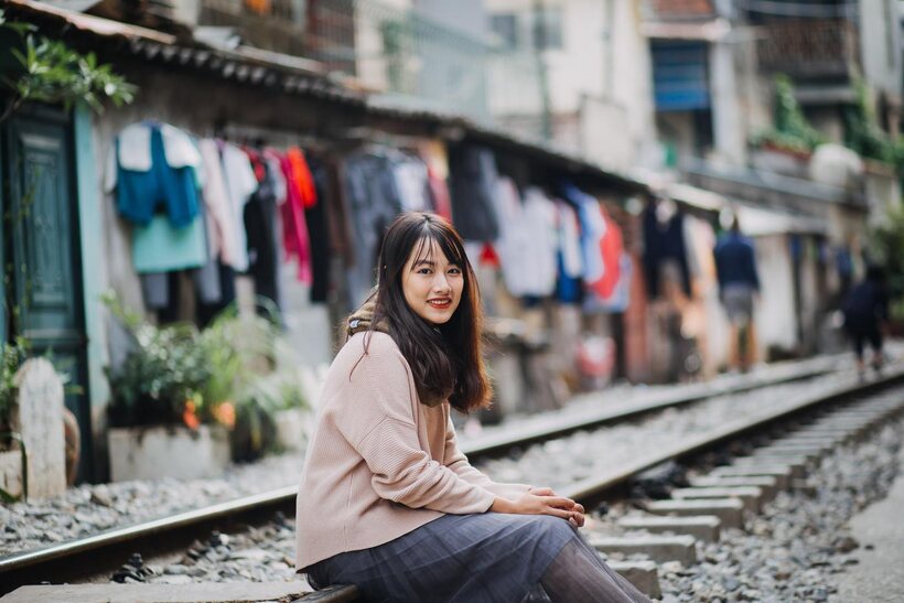 Asian nude photo 10 — Posing on the railroad, this gorgeous Asian model shows off her outfit